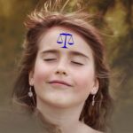 Girl meditating with smile on face